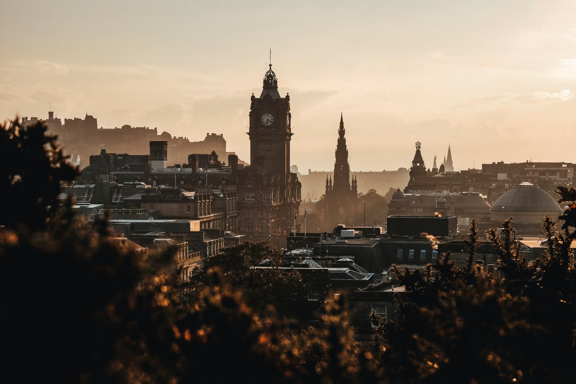 Historic cityscape and Balmoral clock tower in Edinburgh, Scotland